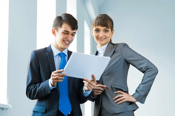 Two business partners discussing reports — Stock Photo, Image