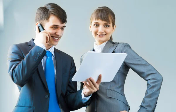 Two business partners discussing reports — Stock Photo, Image