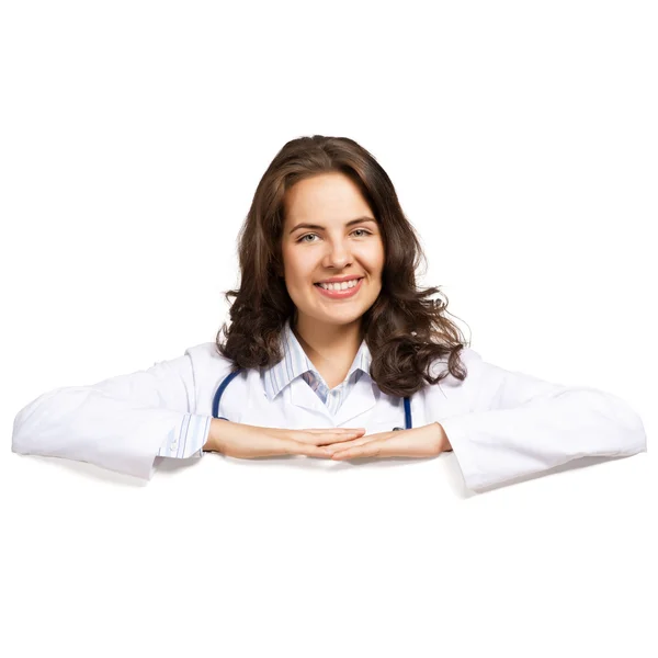 Young woman doctor with a blank banner — Stock Photo, Image