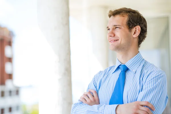 Successful young businessman smiling — Stock Photo, Image