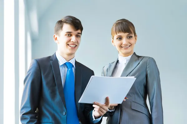 Two business partners discussing reports — Stock Photo, Image