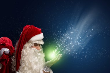 Santa Claus and the magic clipart