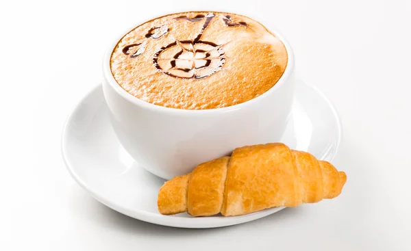 Large cup of coffee and croissants — Stock Photo, Image