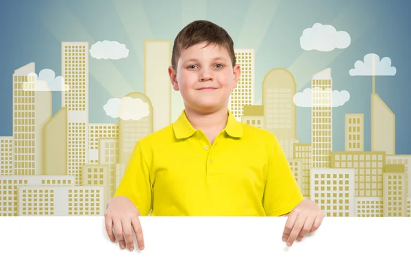 Boy holding a white banner — Stock Photo, Image