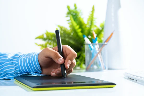 Close-up of a man's hand with a pen stylus — Stock Photo, Image