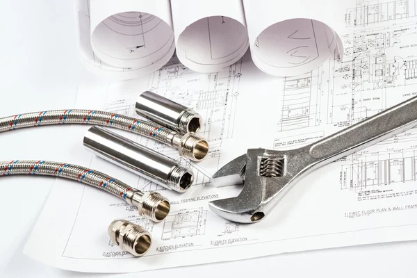 Plumbing and drawings, construction still life — Stock Photo, Image