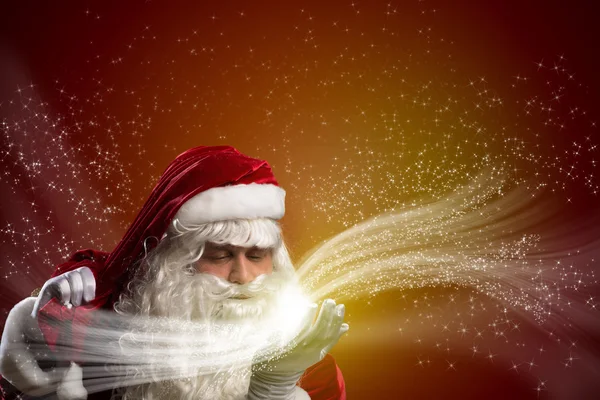 Santa claus en de magie — Stockfoto