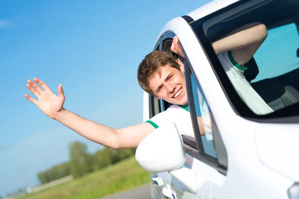 Man stuck his hand out of the window — Stock Photo, Image