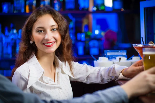Young woman in a bar — Stock Photo, Image