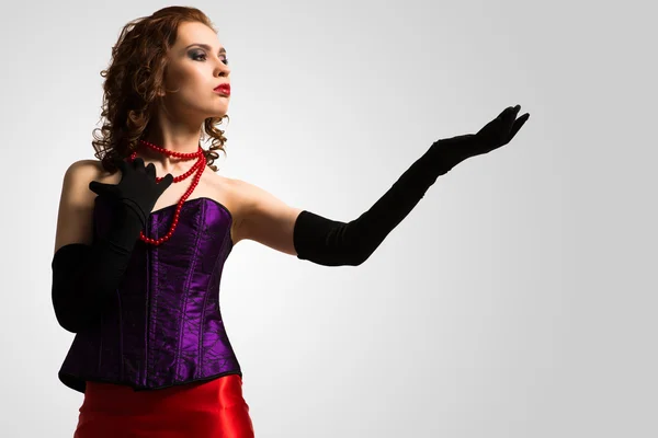 Woman in corset and red dress — Stock Photo, Image