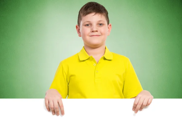 Boy holding a white banner — Stock Photo, Image