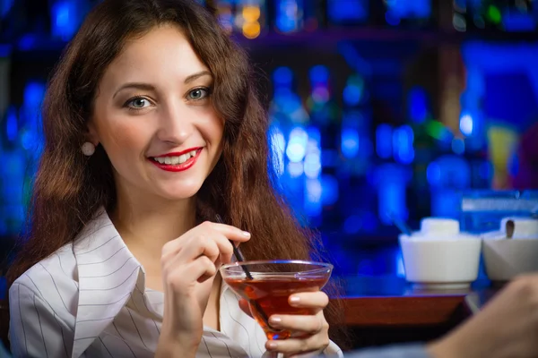 Young woman in a bar Royalty Free Stock Photos