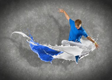 male dancer with splashes of paint clipart