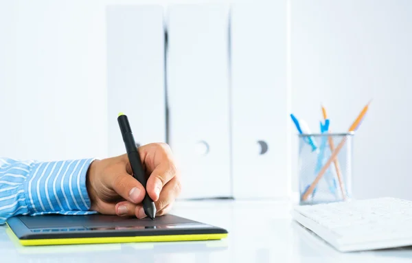 Man's hand with a pen stylus — Stock Photo, Image