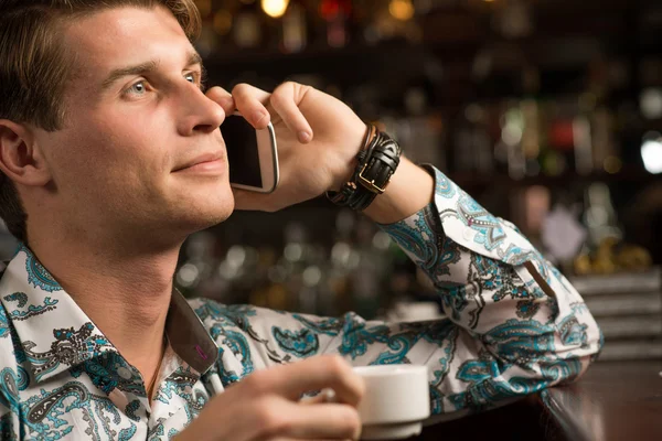 Young man at the bar — Stock Photo, Image