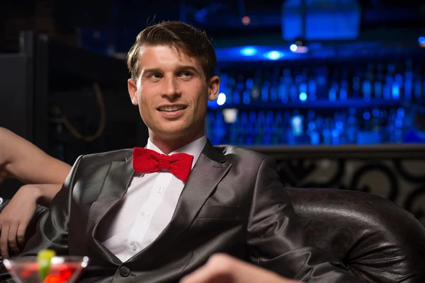 Portrait of a man in a nightclub — Stock Photo, Image