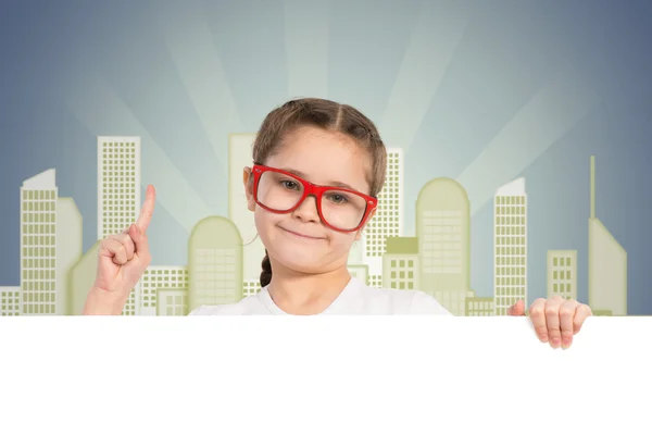 Girl holding a white banner — Stock Photo, Image