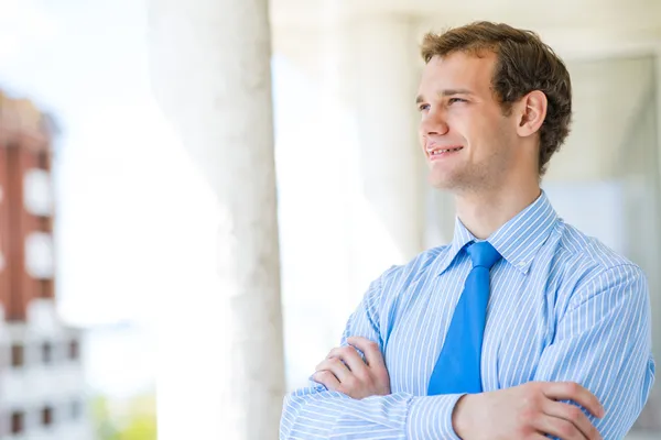 Successful young businessman smiling — Stock Photo, Image