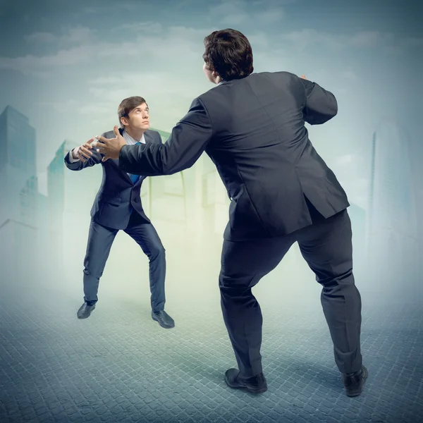 Two businessmen fighting as sumoists — Stock Photo, Image