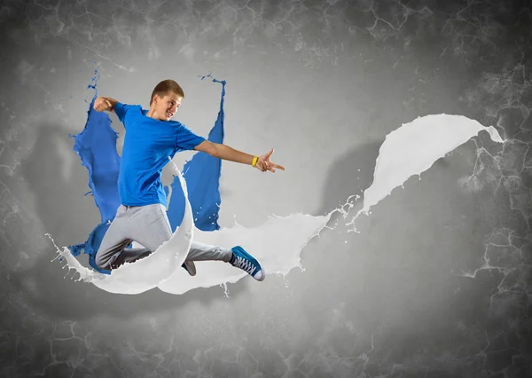 Male dancer with splashes of paint — Stock Photo, Image