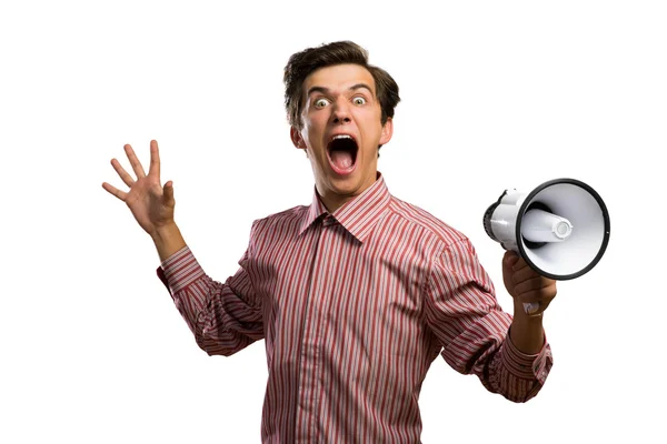 Young man shouting using megaphone — Stock Photo, Image