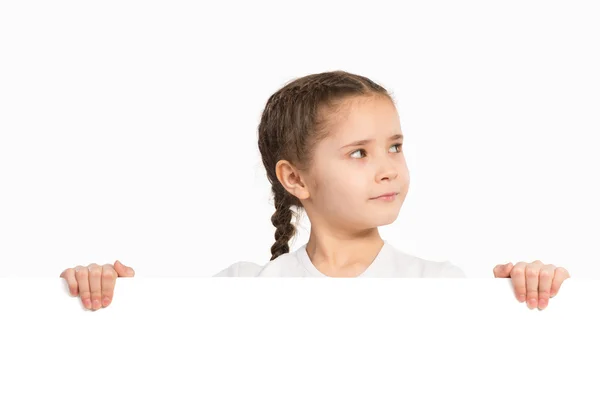 Menina segurando cartaz branco — Fotografia de Stock