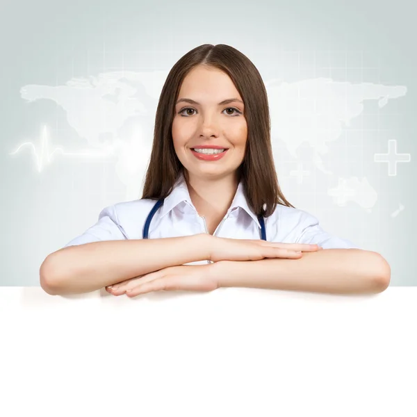 Doctor with a blank banner — Stock Photo, Image