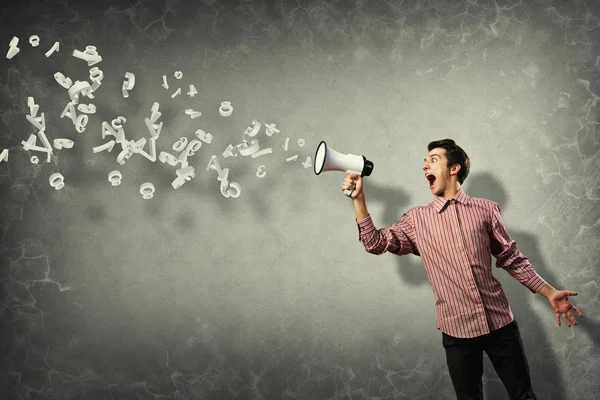 Man shouting using megaphone — Stock Photo, Image