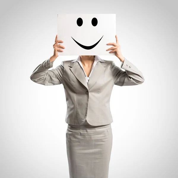 Business woman holding a poster — Stock Photo, Image