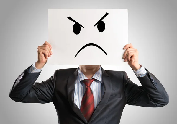 Business man holding a poster — Stock Photo, Image