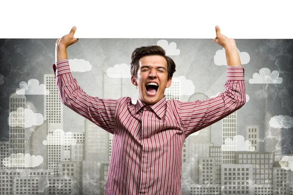 Man holding a banner — Stockfoto