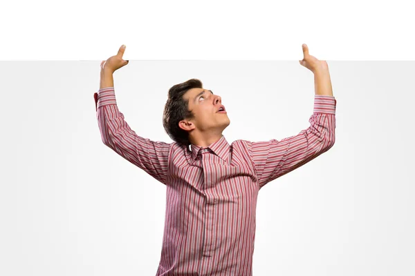 Man holding a banner — Stock Photo, Image