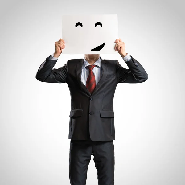 Business man holding a poster — Stock Photo, Image