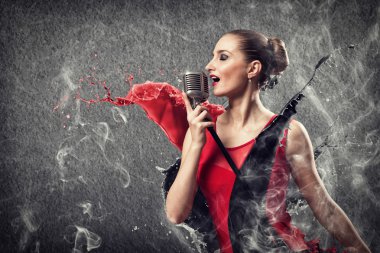 attractive female singer with microphone clipart
