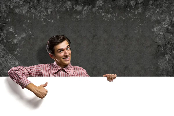 Man holding a banner — Stock Photo, Image