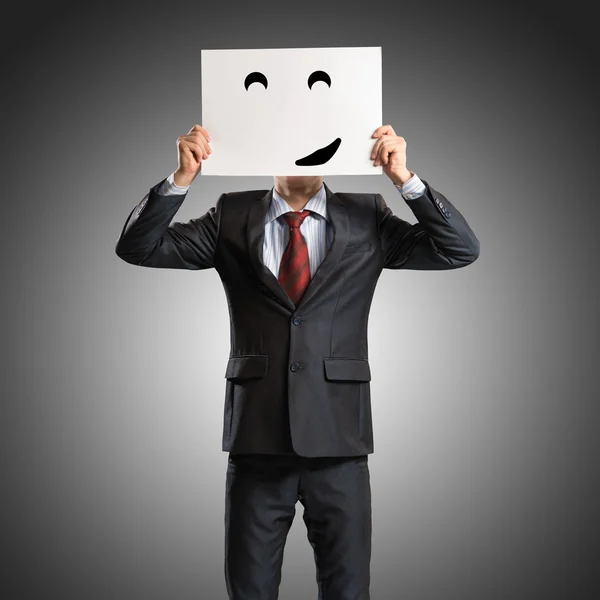 Business man holding a poster — Stock Photo, Image