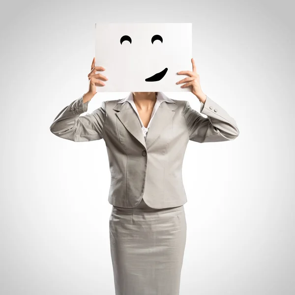 Business woman holding a poster — Stock Photo, Image