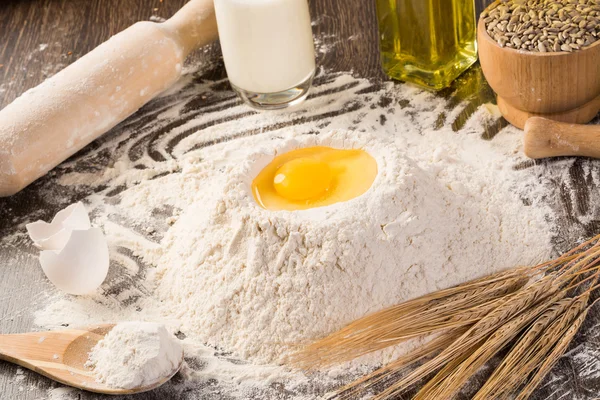 Flour, eggs, white bread, wheat ears — Stock Photo, Image