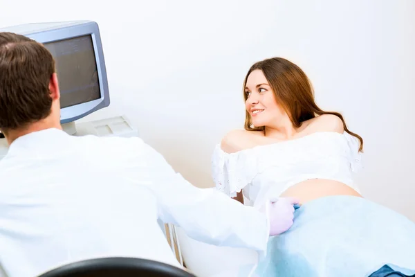 Pregnant woman on reception at the doctor — Stock Photo, Image