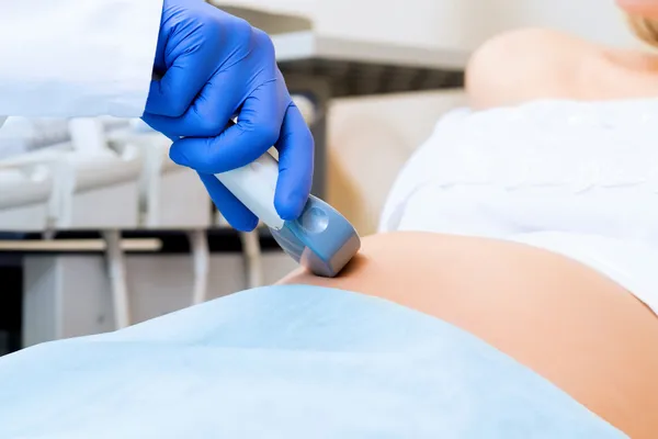 Abdominal ultrasound scanner for pregnant women — Stock Image Abdominal ultrasound scanner for pregnant women Stock Photo