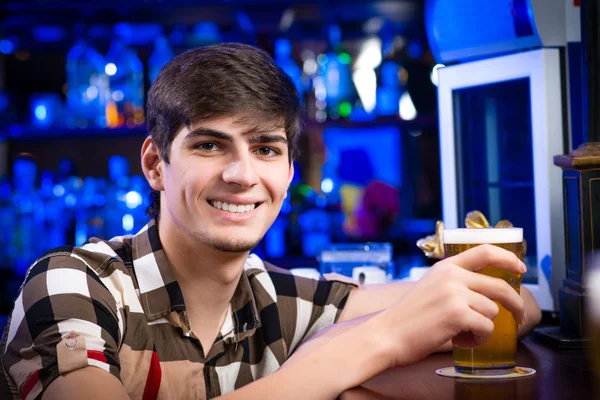 Portrait of a young man at the bar — Stock Photo, Image