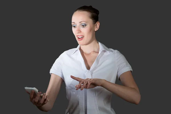 Affärskvinna som innehar en mobiltelefon持有一部手机的商界女强人 — 图库照片