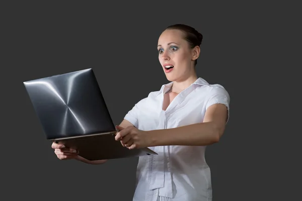 Business woman holding a laptop — Stock Photo, Image