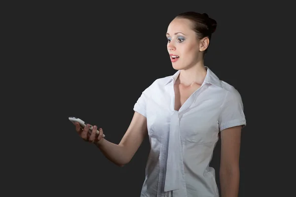 Business woman holding a cell phone — Stock Photo, Image