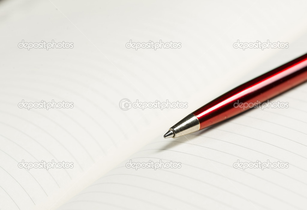 pen and open notepad
