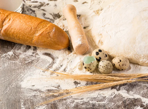 Flour, eggs, white bread, wheat ears — Stock Photo, Image