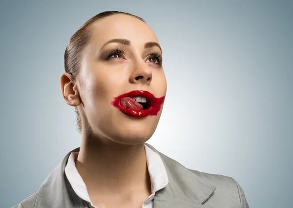 young woman with vivid red mouth