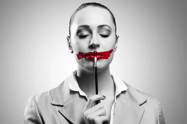 Young woman with vivid red mouth — Stock Photo, Image