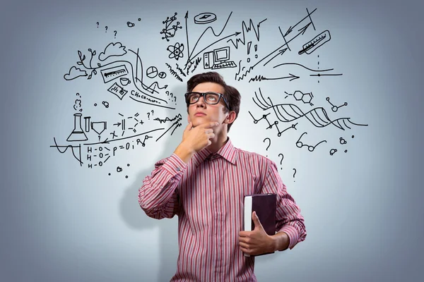 Young man scientist with glasses thinking — Stock Photo, Image