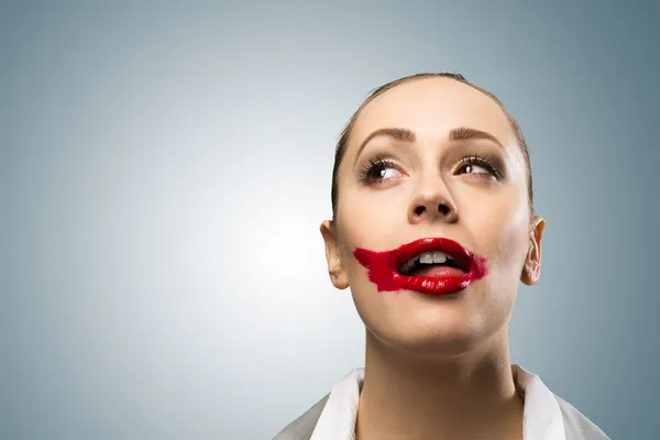 Young woman with vivid red mouth — Stock Photo, Image